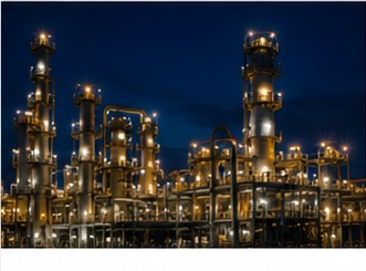 Industrial refinery lit up at night