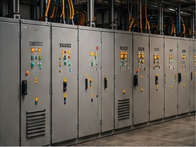 Row of industrial switchboard cabinets